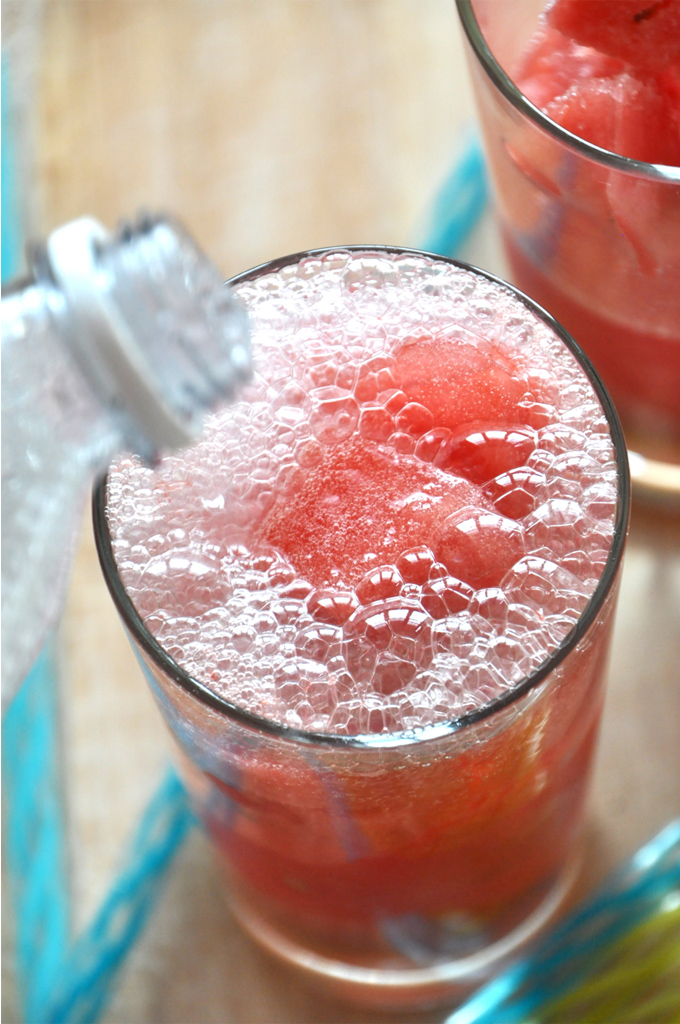 Adult Watermelon-Limeades! Pouring tonic water into a glass for homemade Watermelon Limeade Cocktails