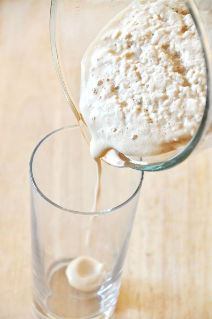 Pouring a glass of our homemade Cold Brew Mocha Frappe