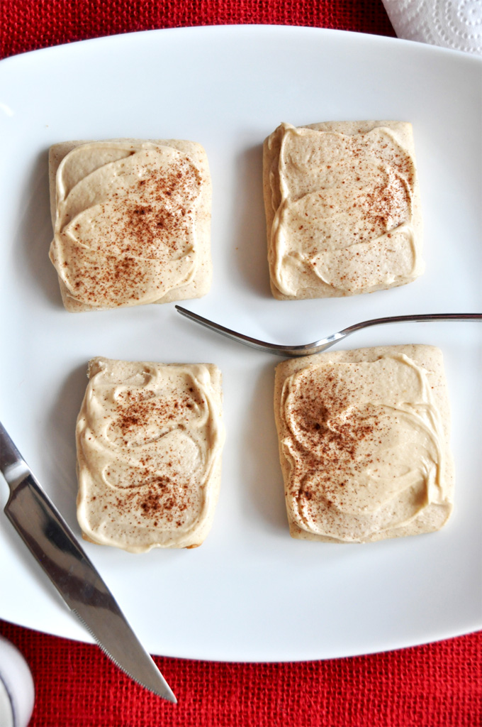 French Toast Cookies!! Plate with a batch of our French Toast Sugar Cookies recipe topped with cinnamon