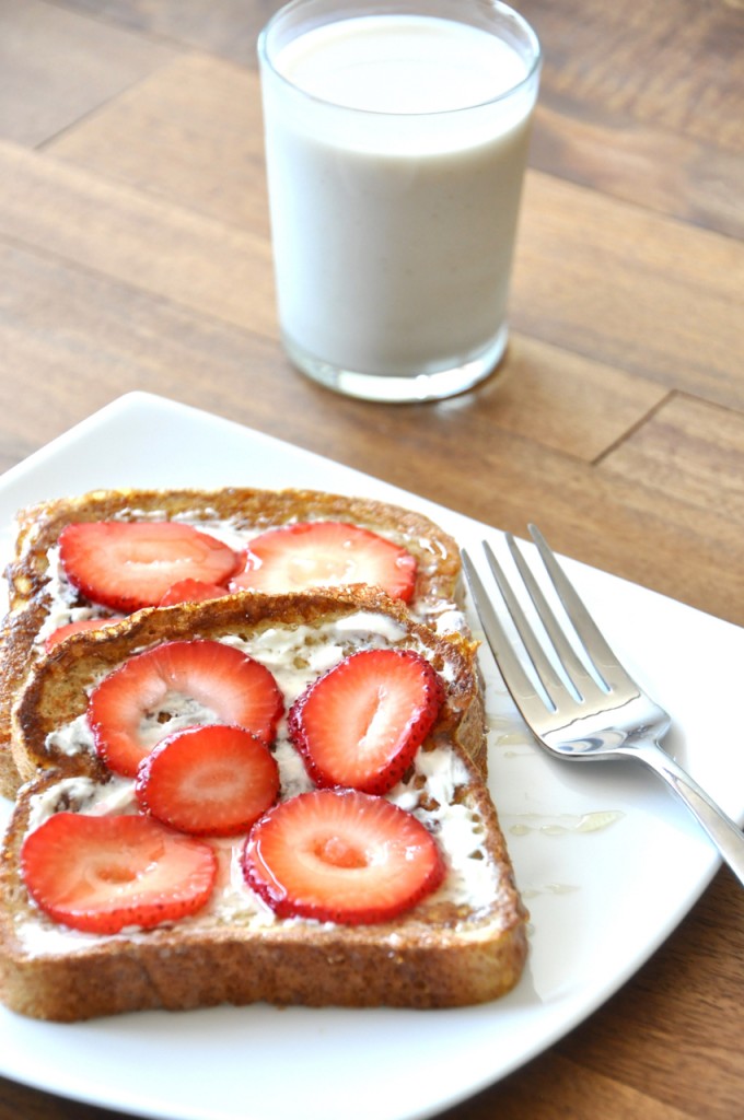 minimalist baker strawberry danish french toast1 Plate with slices of Strawberry Danish French Toast alongside a glass of milk