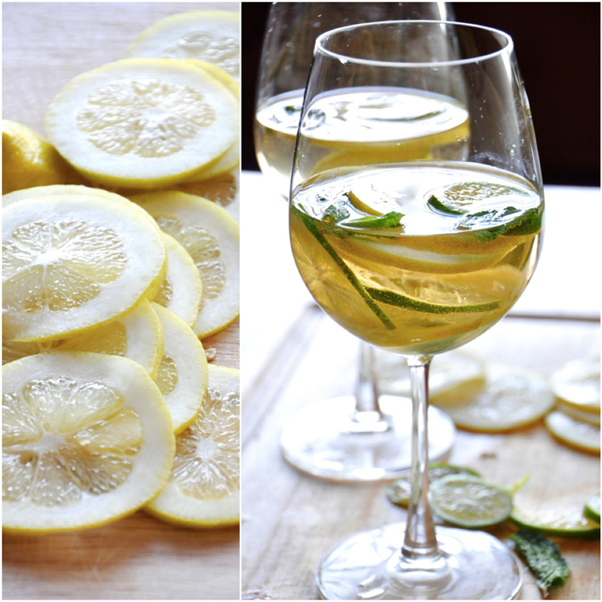 Fresh lemon slices and glasses of Mint and Citrus White Wine Sangria