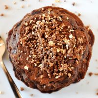 Top down shot of a stack of Vegan No-Bake Cookie Pancakes topped with granola