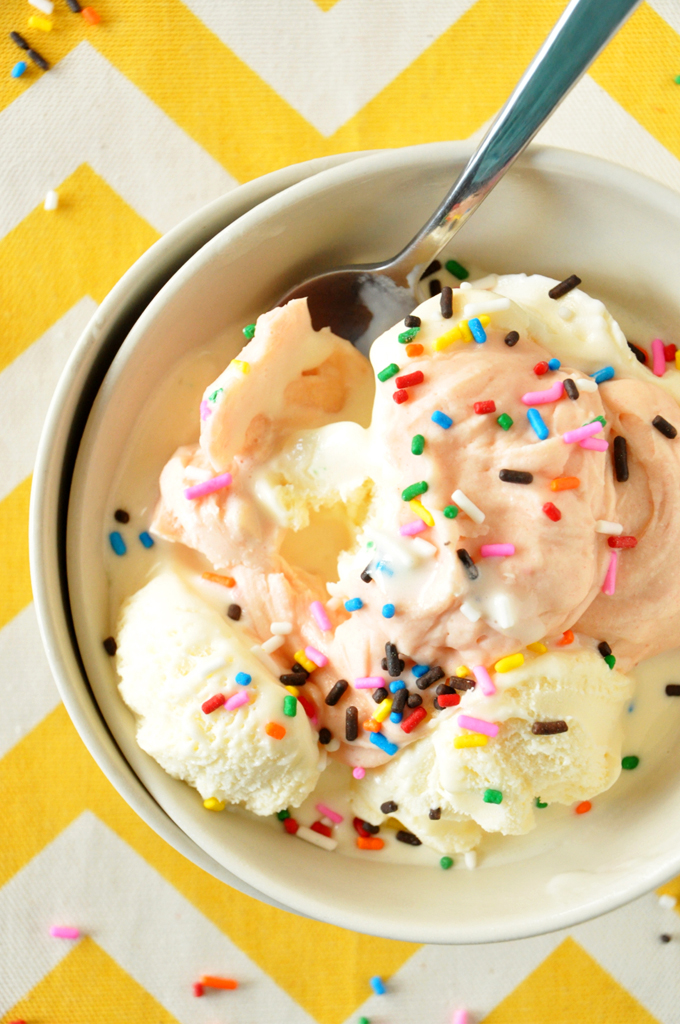 Big bowl of ice cream coated in homemade vegan Strawberry Magic Shell