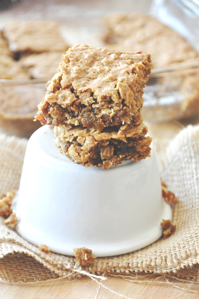 Chai Oatmeal Raisin Cookie Bars Stack of Chai-Spiced Oatmeal Raisin Bars on a stand