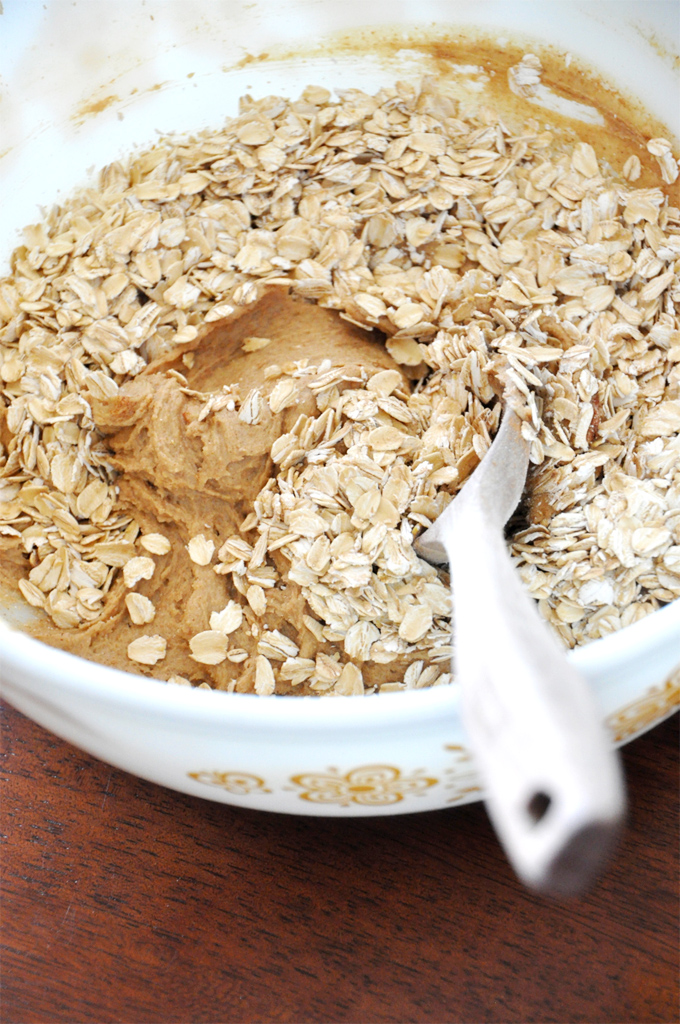 Chai Oatmeal Raisin Cookie Batter Mixing oats into batter for our Chai-Spiced Oatmeal Raisin Bars recipe