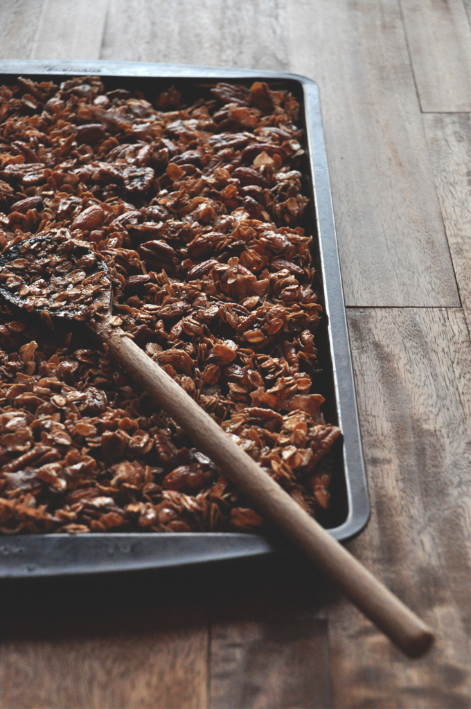 Coconut & Honey Granola || Minimalist Baker Batch of our Nut and Honey Coconut Granola recipe on a baking sheet
