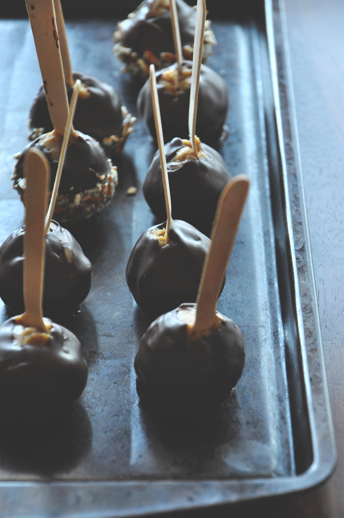 Pumpkin Chocolate Chip Cookie Dough Pops Baking sheet with a batch of our Vegan Chocolate Pumpkin Cookie Dough Pops recipe