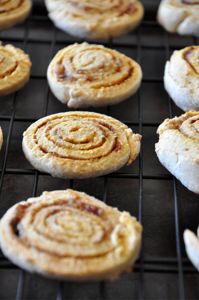 Batch of Pumpkin Cinnamon Roll Cookies on a cooling rack