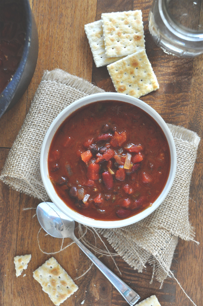 Saltine crackers alongside a bowl of Vegan Beer Chili