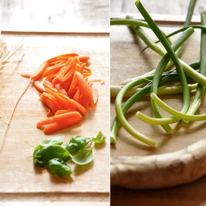 Fresh vegetables on a cutting board for making our recipe for vegan Veggie and Rice Noodle Bowls with Ginger Peanut Dressing