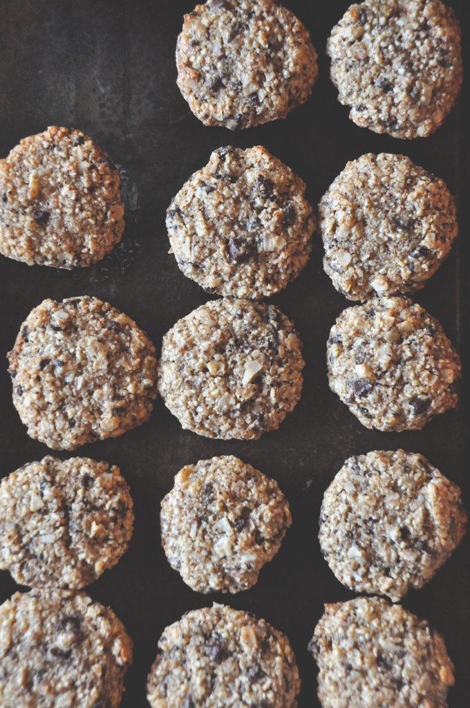 Baking sheet filled with freshly baked Almond Meal Cookies made with chocolate chips and coconut