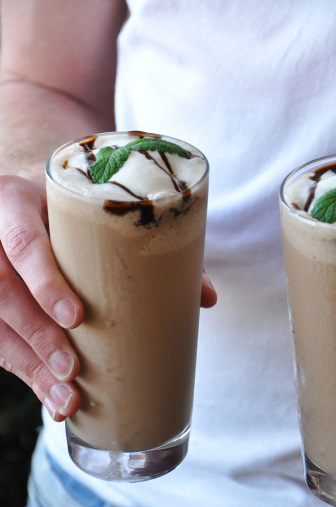 Peppermint Mocha Frappe with Creamy Coconut Milk Holding two glasses of our Peppermint Mocha Frappe for a refreshing summer beverage