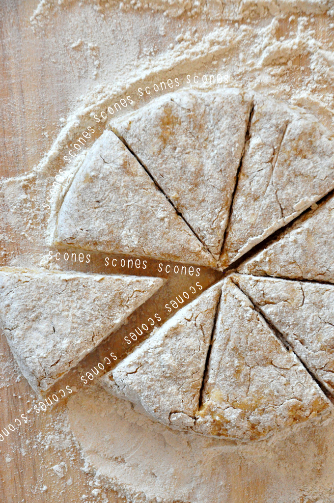 Pumpkin Scones Cut Cutting board with a batch of freshly cut scones ready to be baked
