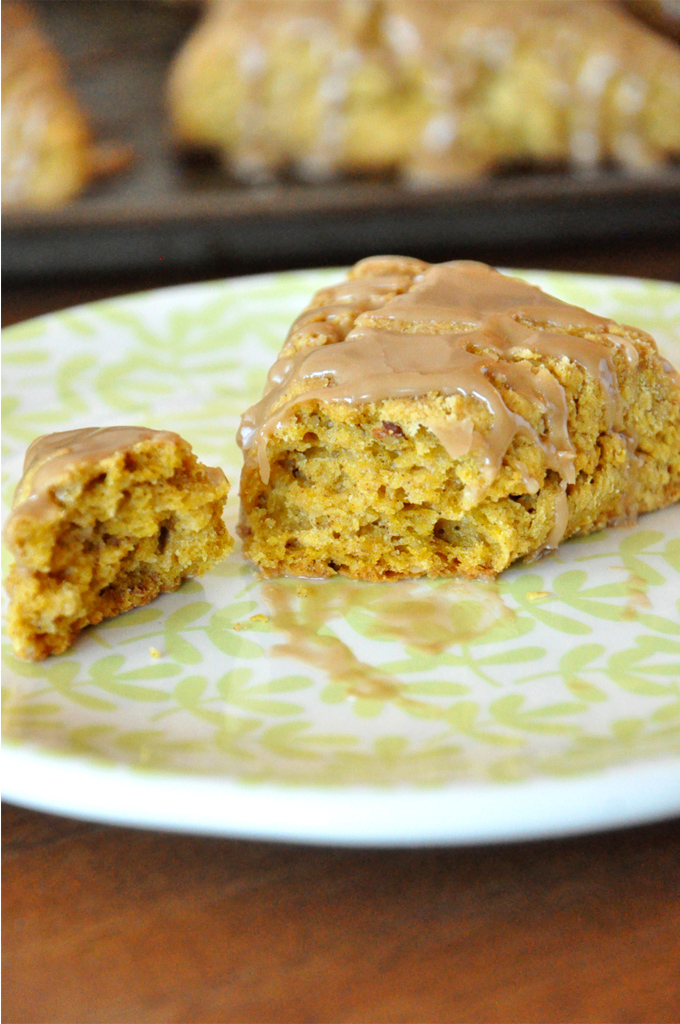 Pumpkin Scones with Maple Glaze - Minimalist Baker Revealing the flaky interior of one of our homemade Pumpkin Scones