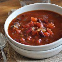 Stack of bowls filled with Vegan Beer Chili