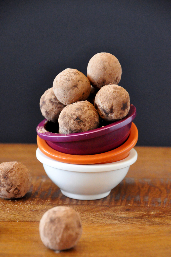 Vegan Mayan Truffles | minimalistbaker.com Stack of bowls with Raw Mayan Vegan Truffles piled into the top bowl