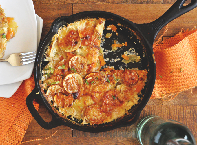 Pan of our Sweet Potato Parmesan Gratin recipe with a slice removed