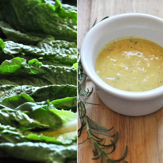 Leaves of romaine and a bowl of Rosemary Caesar Dressing