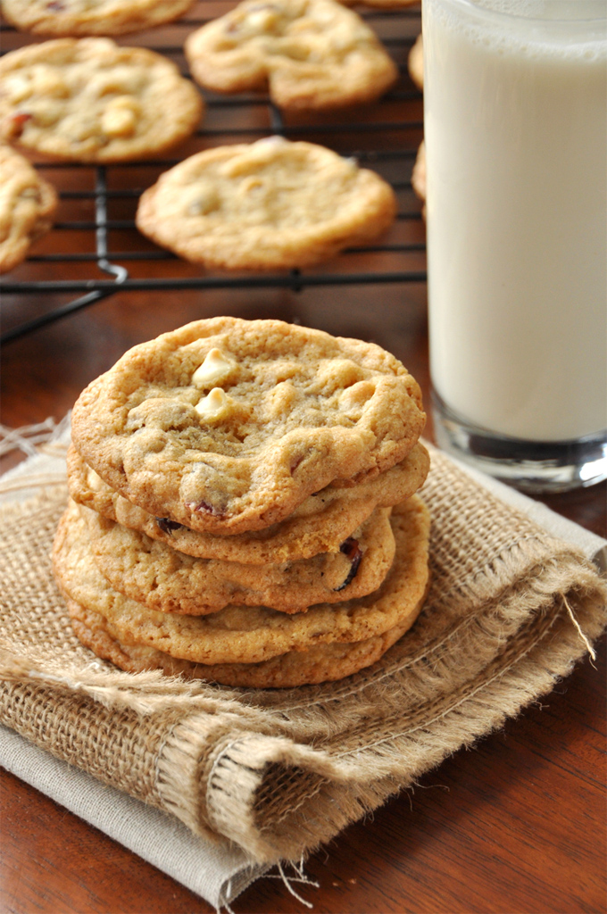 Whole Wheat White Chocolate Cranberry Cookies | MinimalistBaker.com Stack of White Chocolate Cranberry Cookies alongside a glass of milk