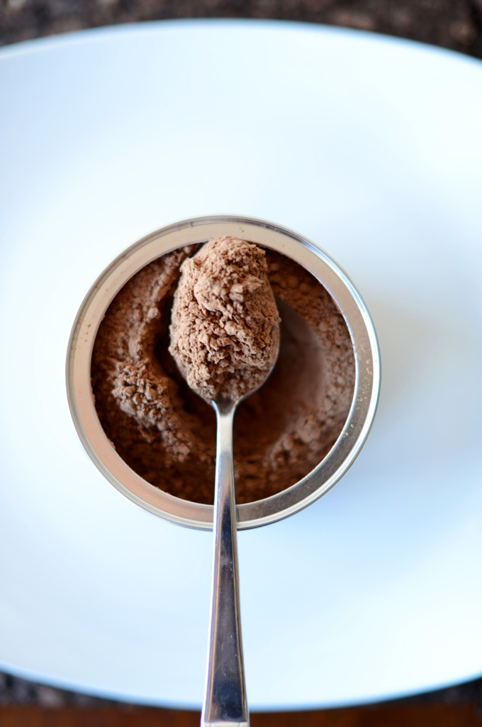 Container of cocoa powder for making homemade hot cocoa