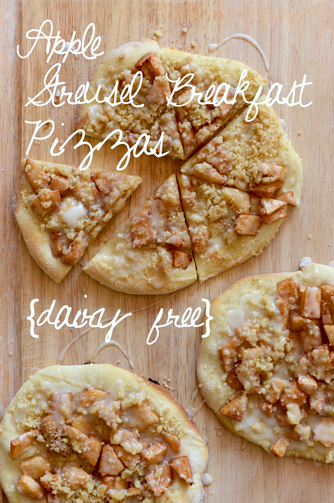 Cutting board topped with homemade dairy-free Apple Streusel Breakfast Pizzas