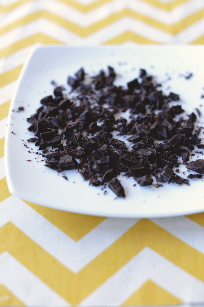 Plate of chopped dark chocolate for making Almond Joy Nut Butter Spread