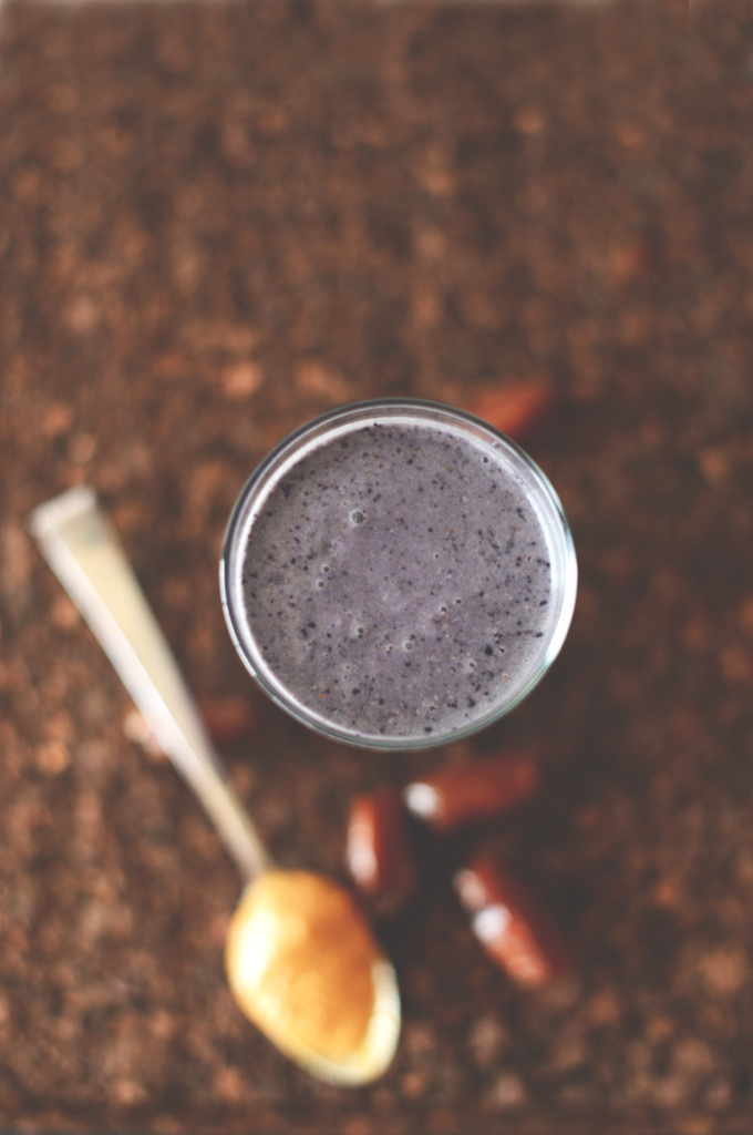 Peanut butter, dates, and a glass of our Peanut Butter and Jelly Smoothie