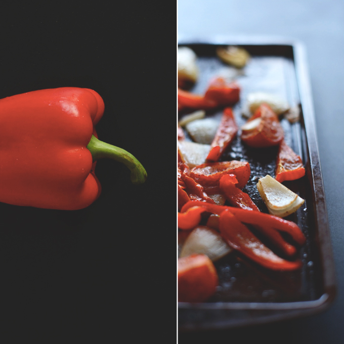 Roasted red pepper and onions on a baking sheet