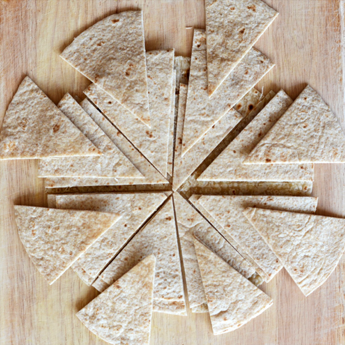 Freshly cut tortilla triangles for making homemade chips