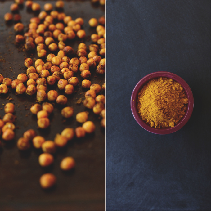 Baking sheet of crispy Chickpeas and bowl of curry powder for making them