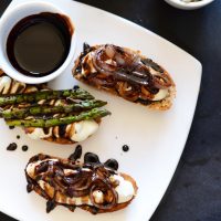 Plate of Bleu Cheese Bites topped with caramelized onion or asparagus