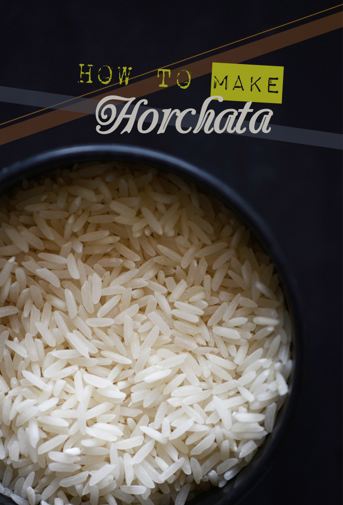Measuring cup of rice to represent our post on how to make horchata