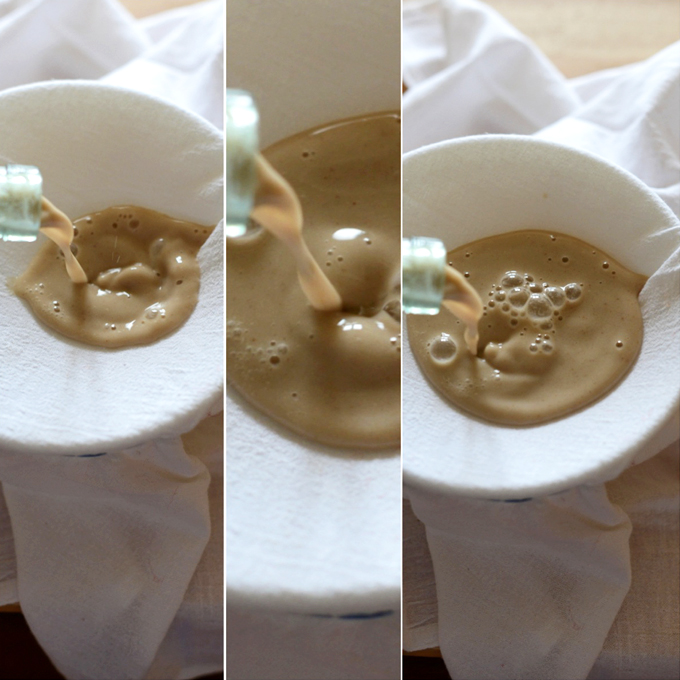 Straining Horchata through a cheesecloth to give it a smooth and creamy texture