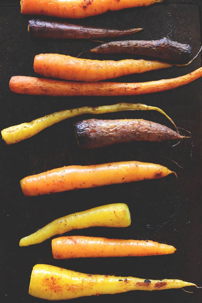 Baking sheet filled with freshly roasted carrots