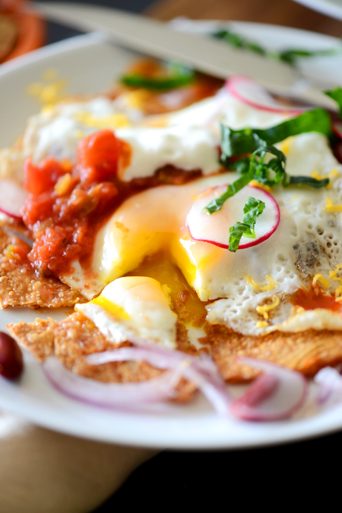 Grabbing a bite of our healthy Gluten-Free Breakfast Tostada recipe
