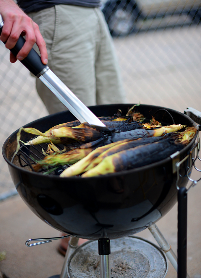 John grilling ears of corn