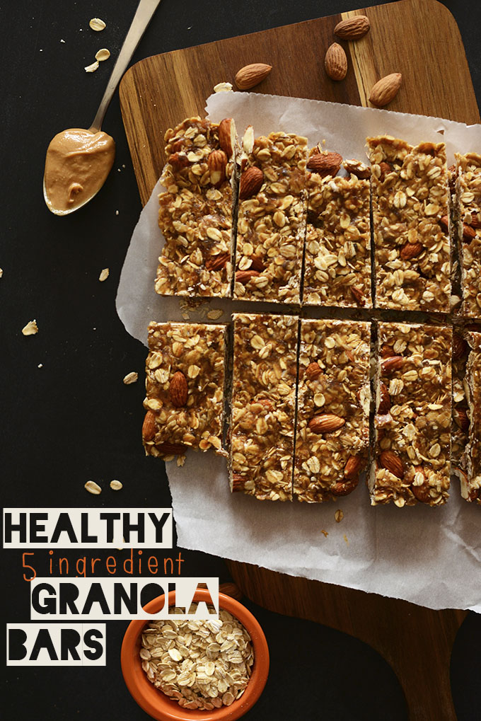 Batch of Healthy 5-Ingredient Granola Bars on a parchment-lined cutting board