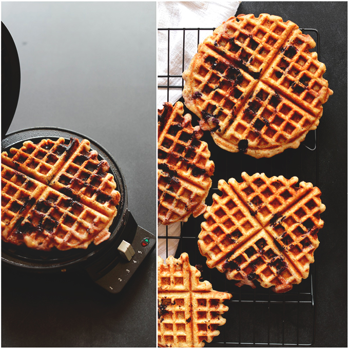 Waffle maker and cooling rack holding Lemon Blueberry Gluten-Free Waffles