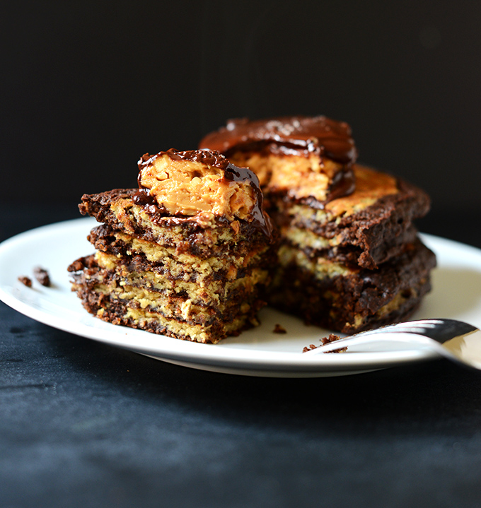 Showing the fluffy inside of a stack of our Peanut Butter Cup Pancakes