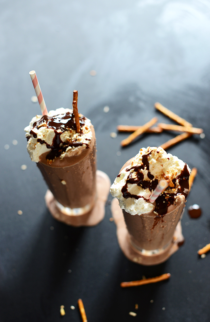 Tall glasses of Pretzel Frozen Hot Chocolate for a decadent vegan dessert