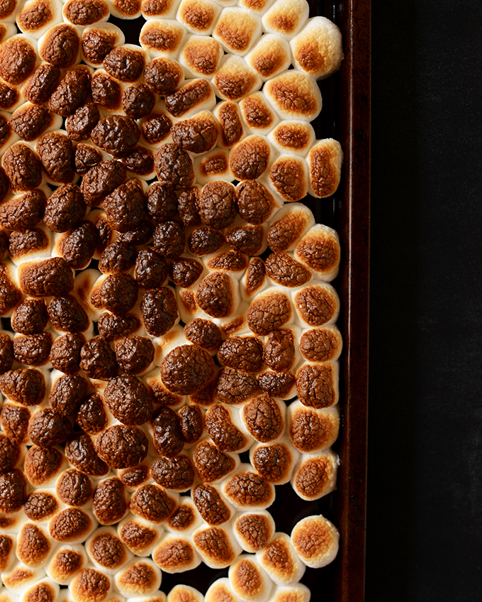 Pan of toasted marshmallows for making Smores Rice Krispie Treats