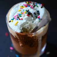 Dairy-Free Copycat DQ Cupcake topped with rainbow sprinkles