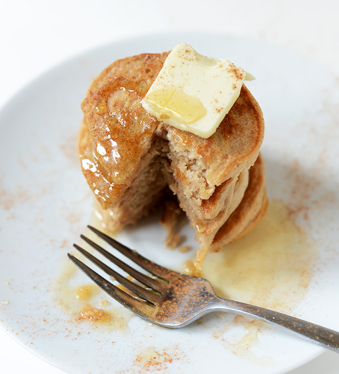 Stack of Dairy-Free Mini Sopapilla Pancakes with a bite removed
