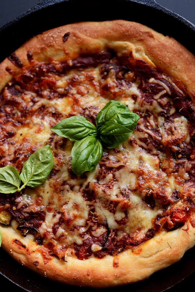 Skillet filled with a batch of our 45-Minute Deep Dish Veggie Pizza recipe