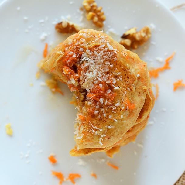 Partially eaten stack of Vegan Carrot Coconut Pancakes