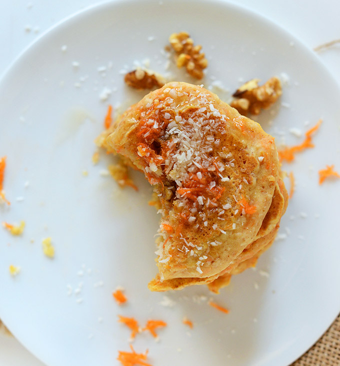 Partially eaten stack of Carrot Coconut Vegan Pancakes