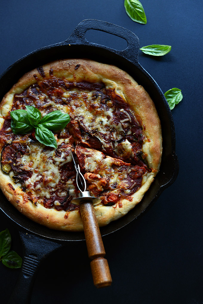 Skillet filled with a batch of our Deep Dish Pizza recipe