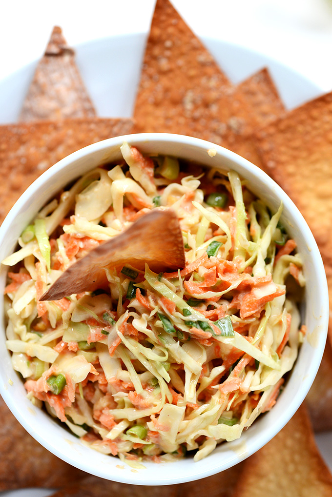 Bowl of Creamy Thai Slaw with wonton chips