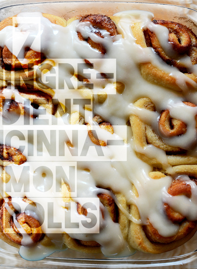 Pan with a batch of Vegan Cinnamon Rolls topped with icing
