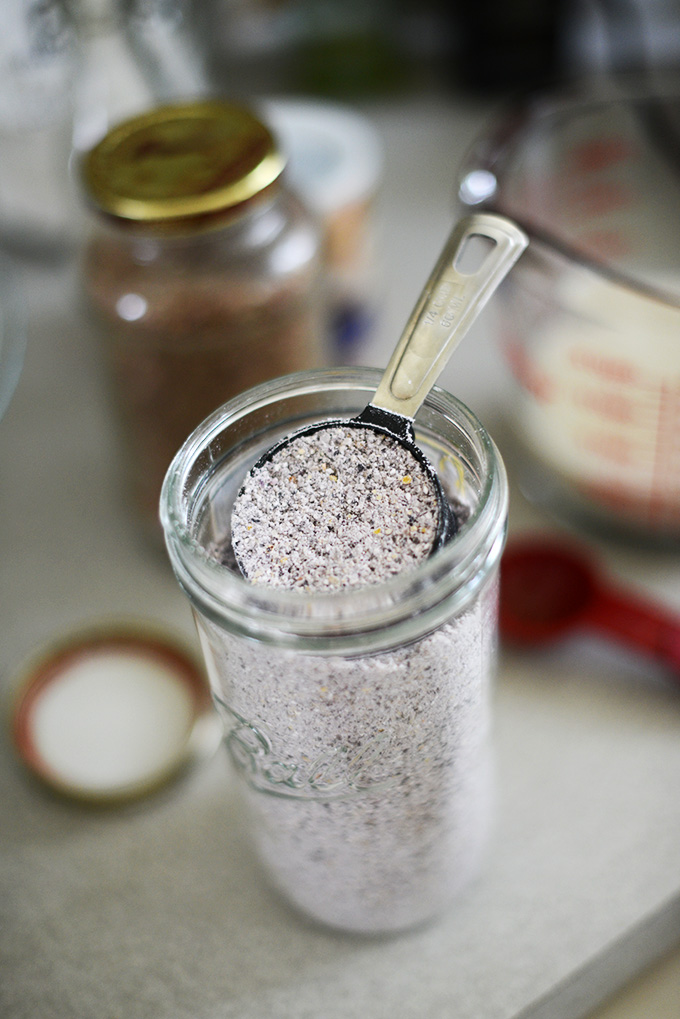 Jar of blue cornmeal for making gluten-free waffles